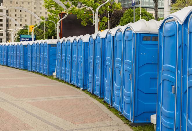 a row of sleek and modern portable restrooms at a special outdoor event in Dania Beach, FL